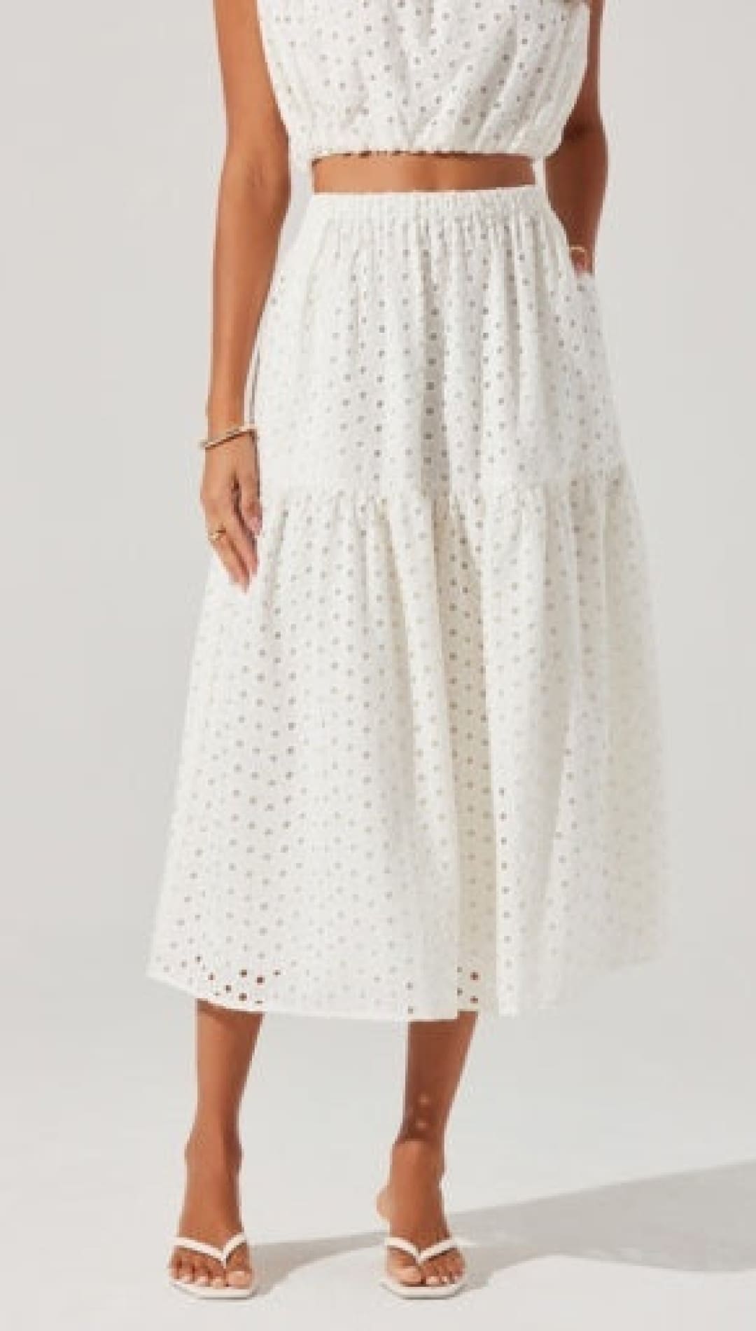 White eyelet tiered midi skirt.