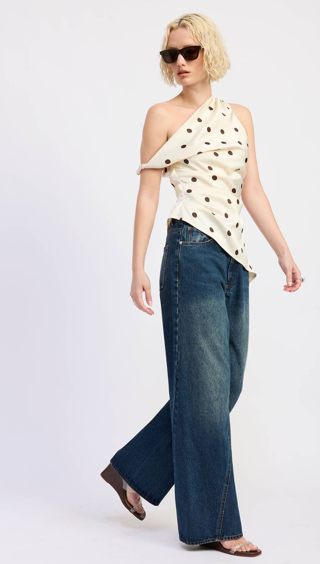 Off-the-shoulder cream top with black polka dots