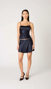 Satin navy blue camisole and mini skirt set.