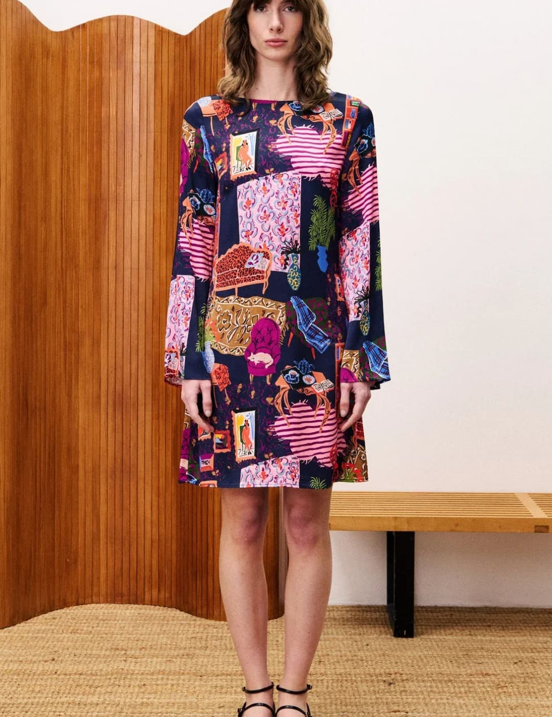 Multicolored patchwork dress with floral and geometric patterns, likely made of cotton or linen.