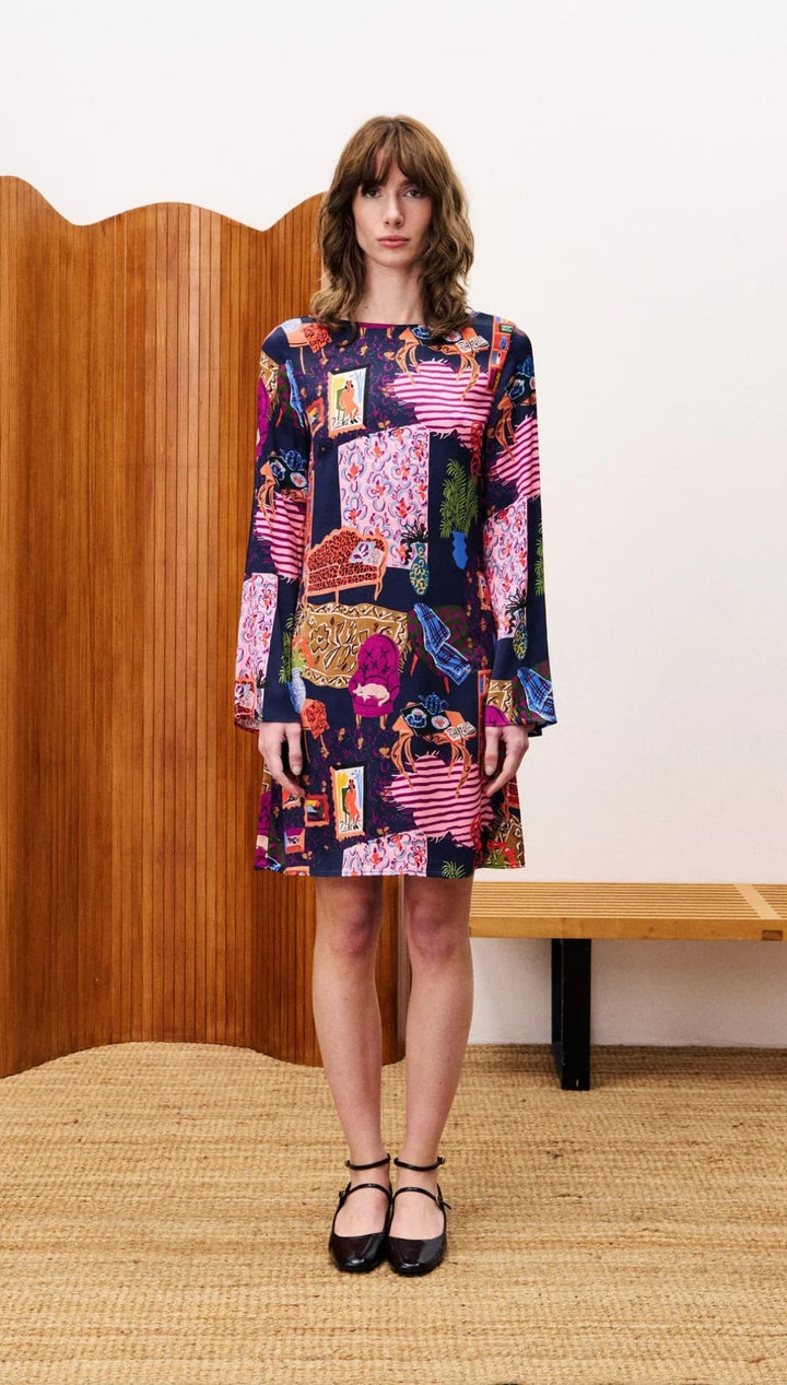 Multicolored patchwork dress with floral and geometric patterns, likely made of cotton or linen.