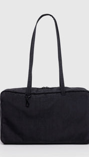Black nylon tote bag with zipper closure and adjustable shoulder strap.