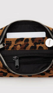 Leopard print fanny pack with black accents and silver hardware.