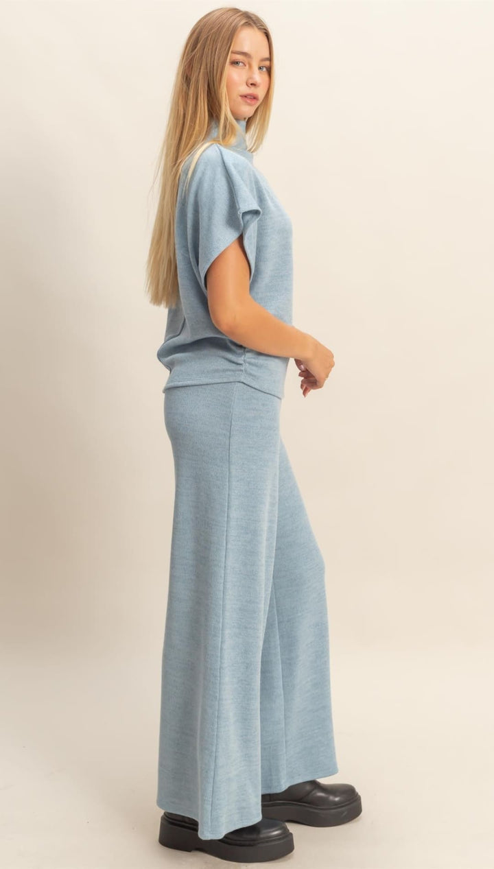 Light blue short-sleeved top and wide-leg pants set.