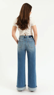 Blue high-waisted jeans with a straight leg design and white stitching.
