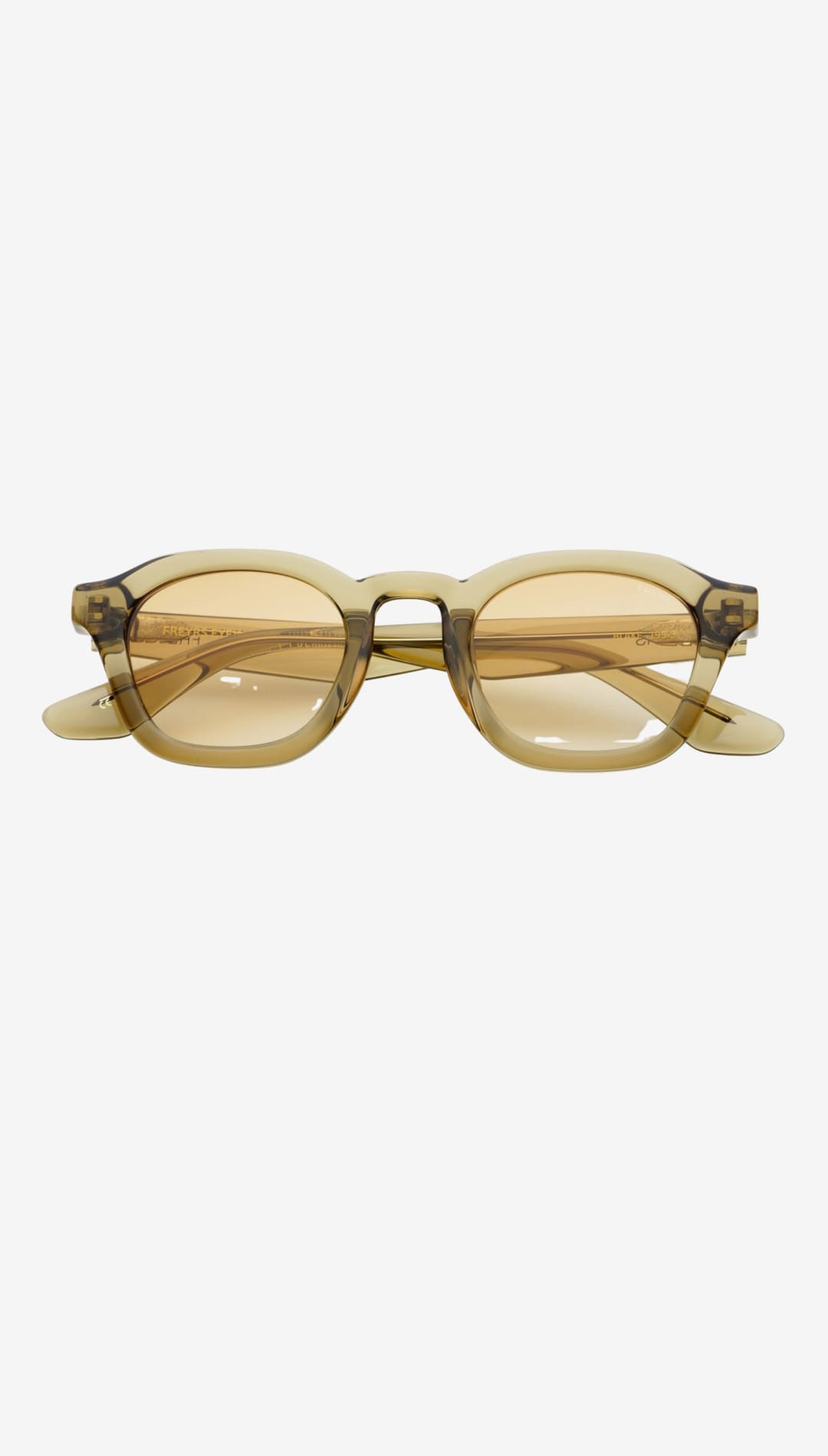 A pair of amber-tinted, translucent acetate-framed sunglasses with a retro-inspired design.
