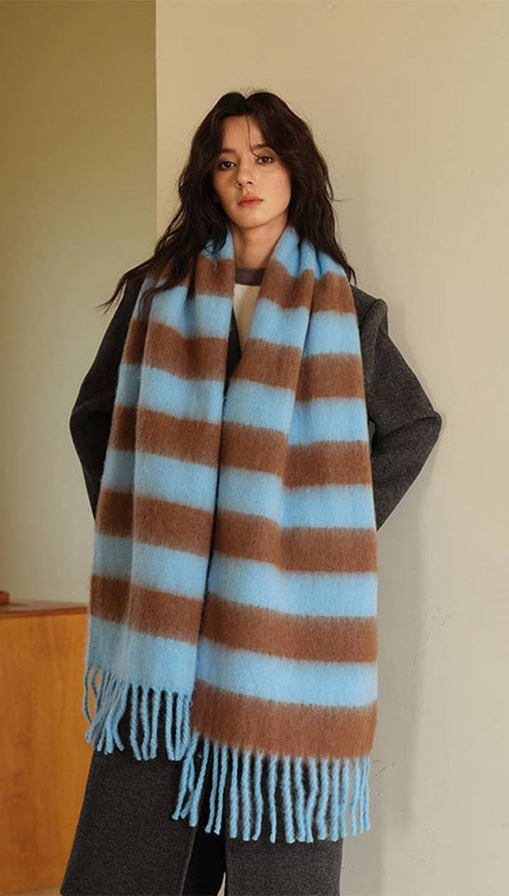Brown and blue striped scarf with tassels, likely made of wool or acrylic.