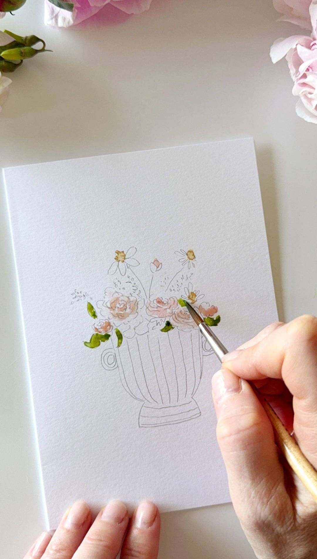 White ceramic vase with pink roses and greenery painting