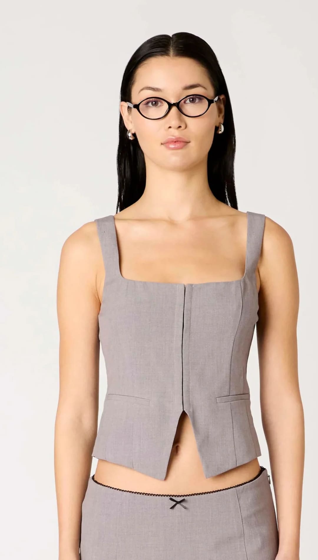 Gray sleeveless square-neck crop top with a front slit.