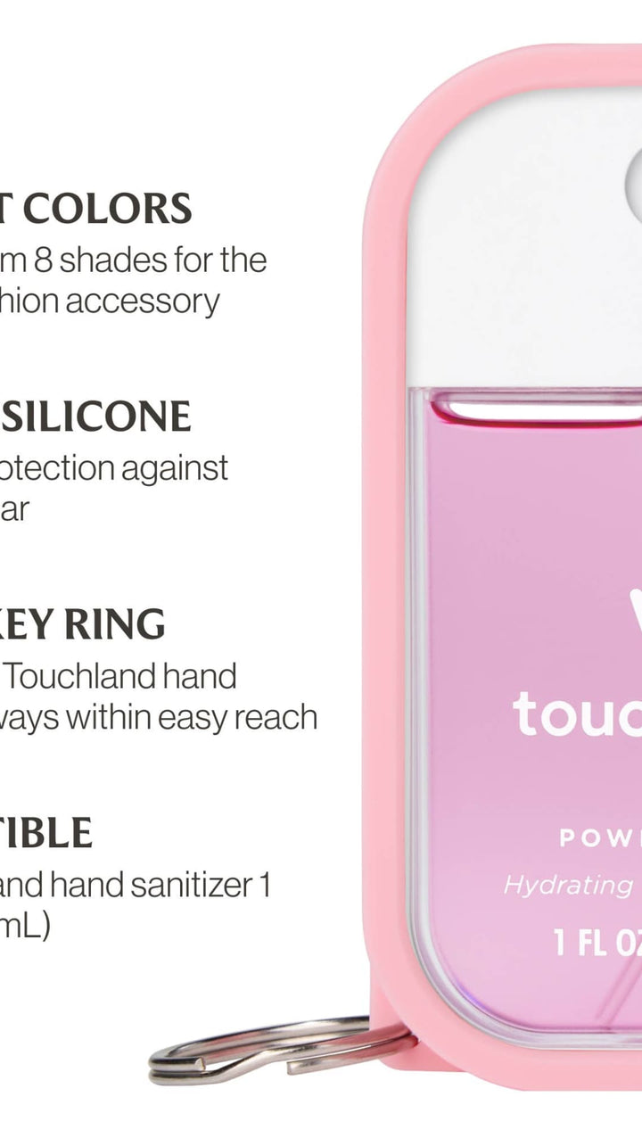 Pink silicone hand sanitizer case with metal key ring and clear lid, touchland brand.