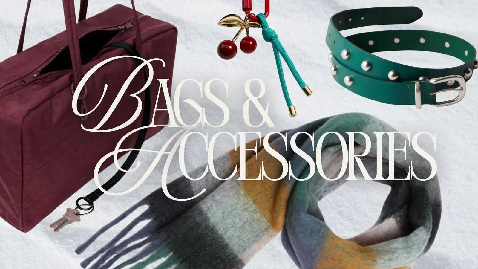 Burgundy leather tote bag with silver hardware and adjustable strap