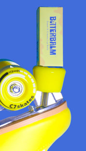 Yellow roller skate with lip balm.