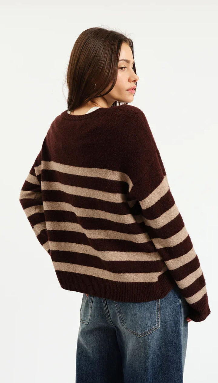Brown and beige striped sweater with a relaxed fit, made of soft knit material.