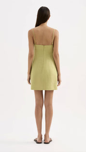 A sleek, olive-green mini dress with thin spaghetti straps and a straight-back design.