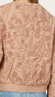 Floral-embroidered quilted jacket.