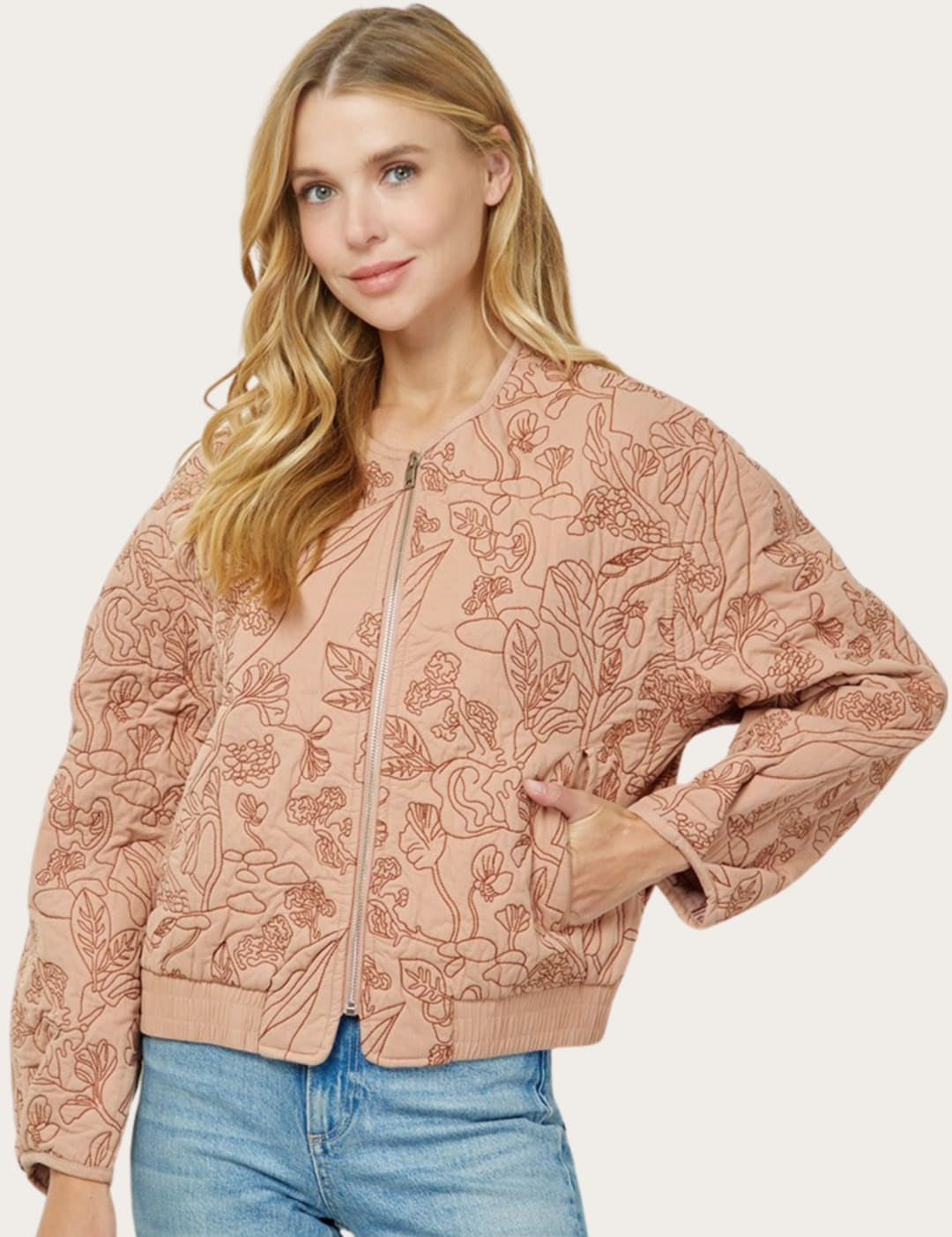 Floral-patterned bomber jacket.