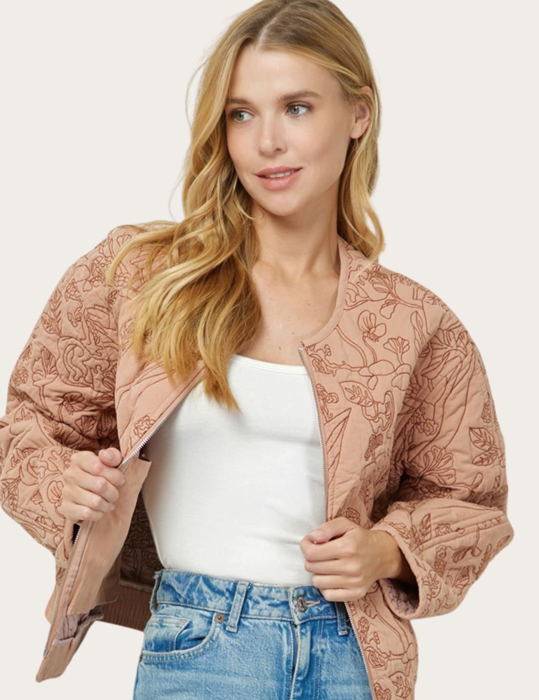 Floral-patterned quilted jacket.
