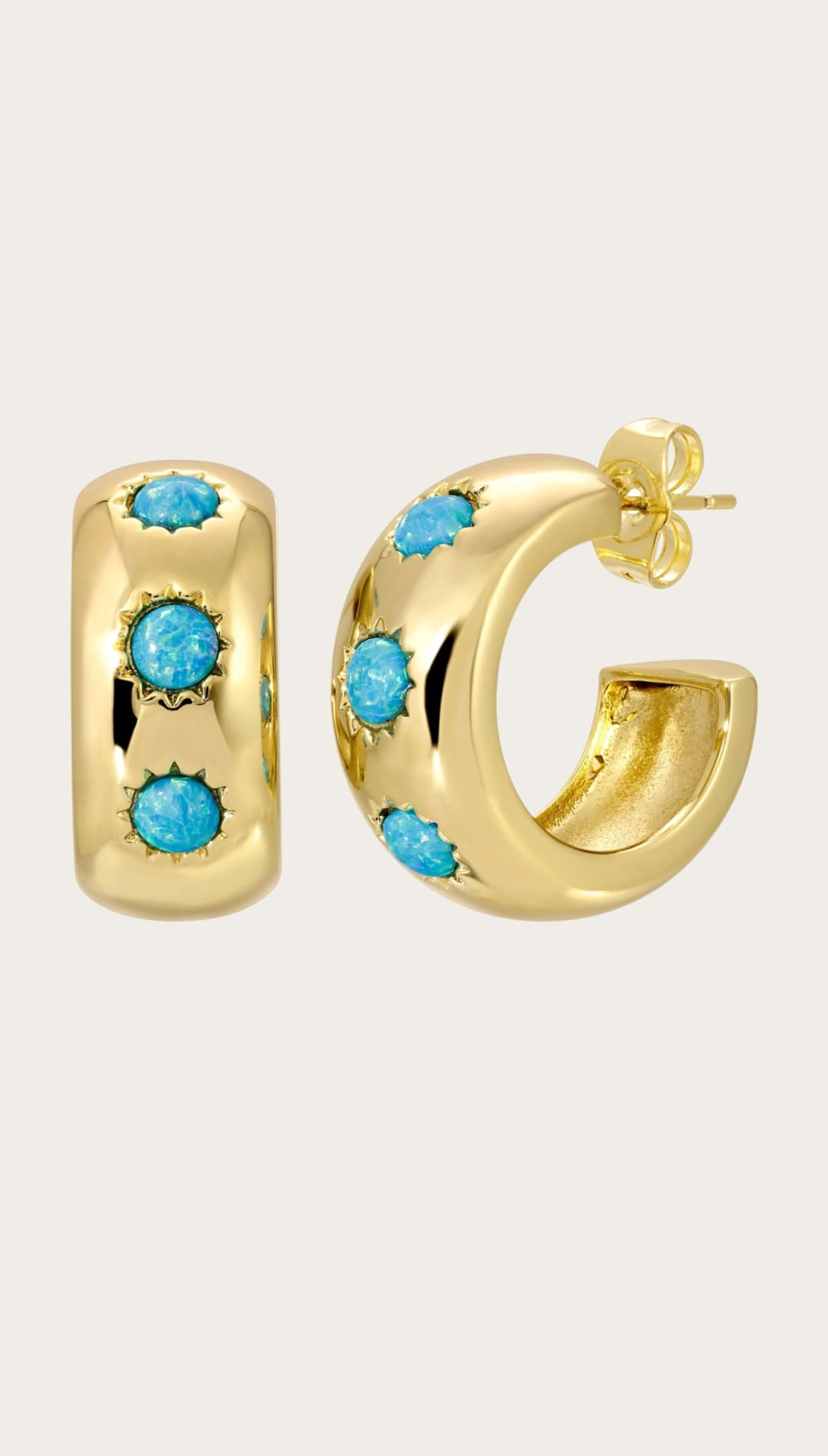 Gold hoop earrings with turquoise stones.