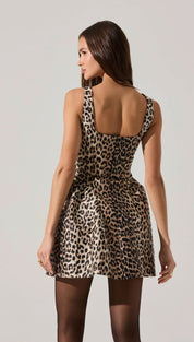 A leopard print mini dress with a square neckline.
