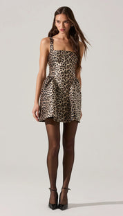 Leopard print mini dress with thick straps and a gathered skirt.