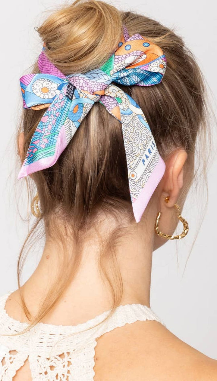 Colorful patterned hair scarf.