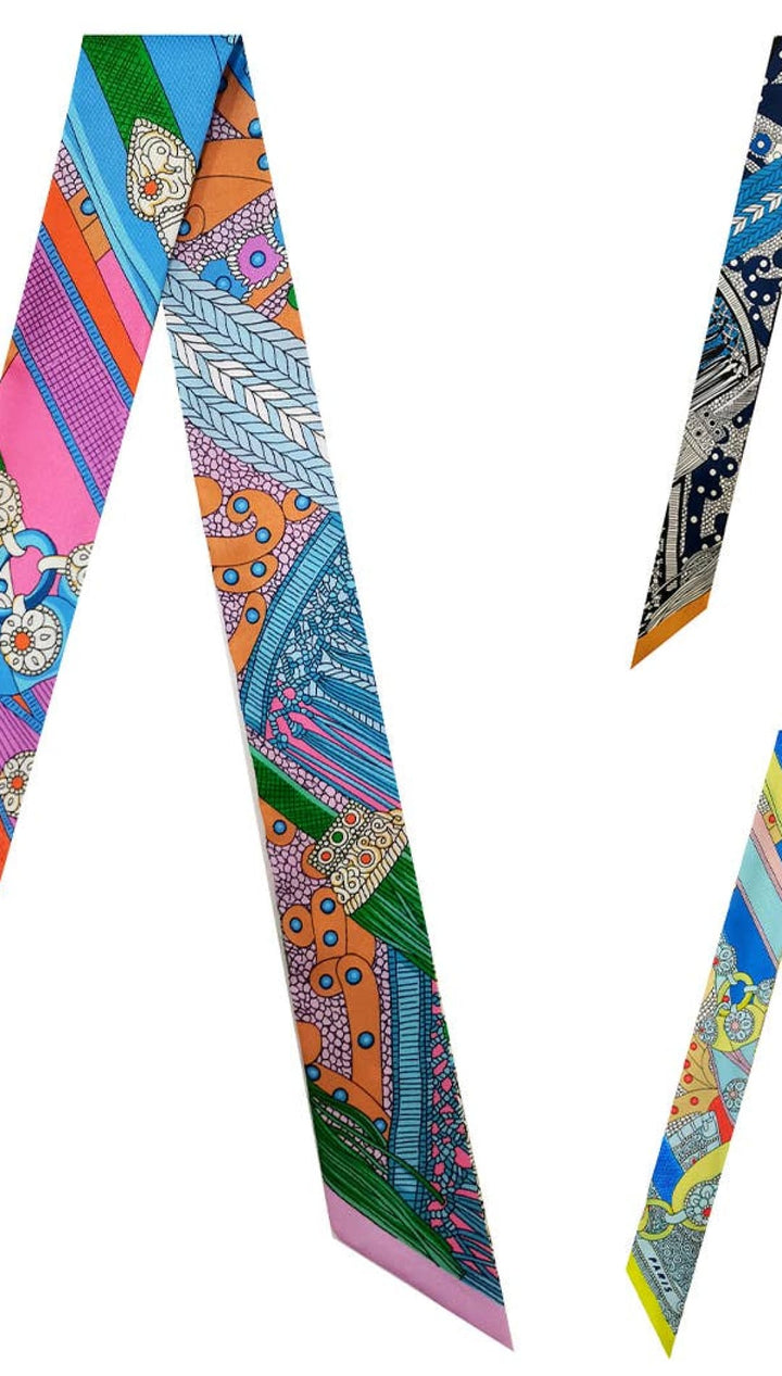 Colorful patterned silk twilly scarves.