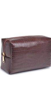 Brown crocodile-patterned leather cosmetic bag with gold zipper.