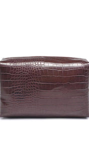 Crocodile-patterned brown leather cosmetic bag with zipper closure.