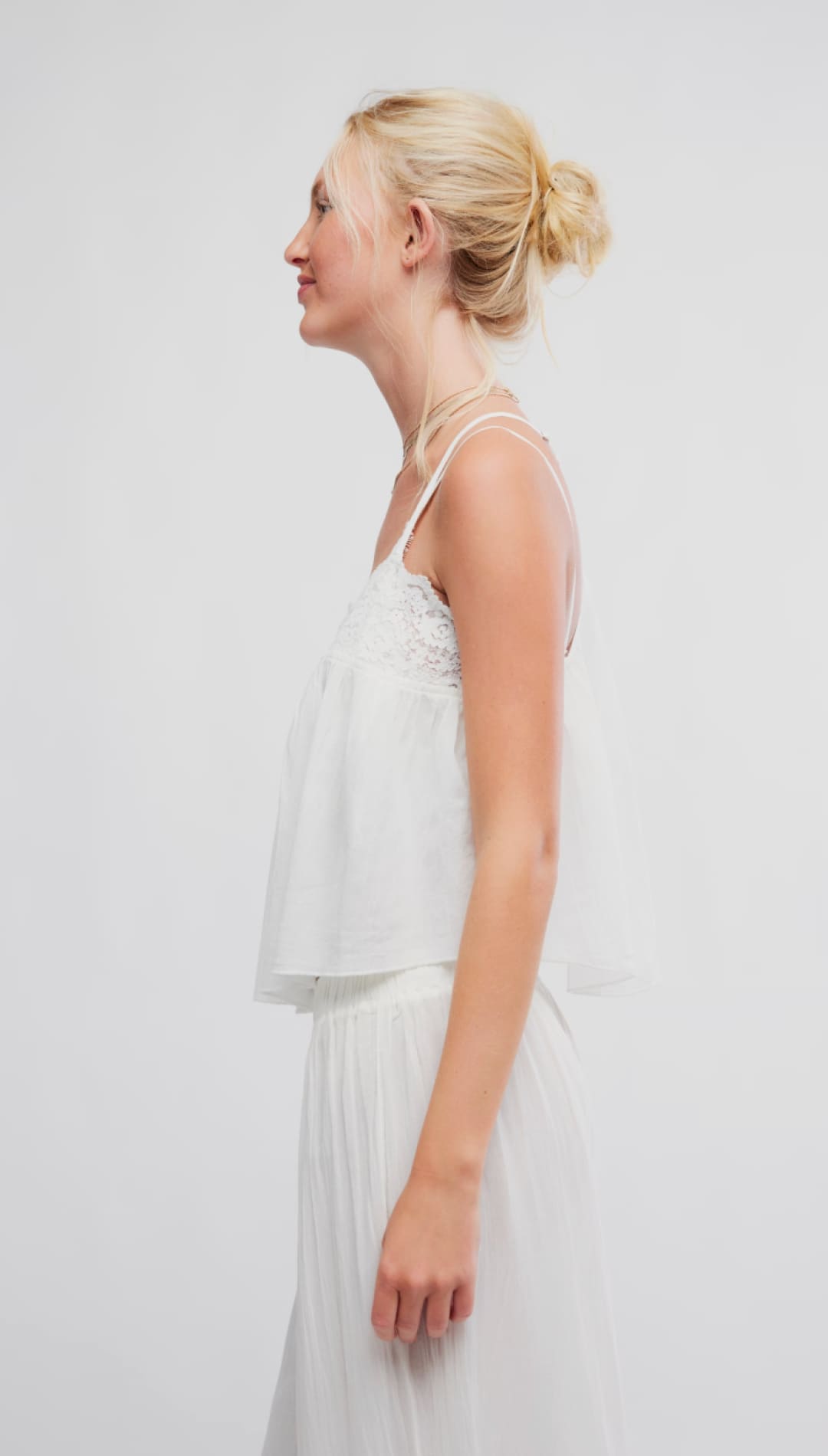 White lace-trimmed spaghetti strap top