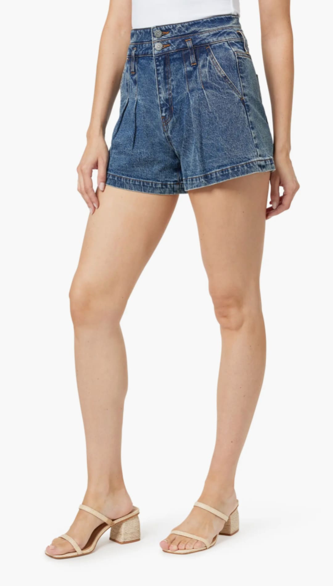 Blue denim pleated shorts.