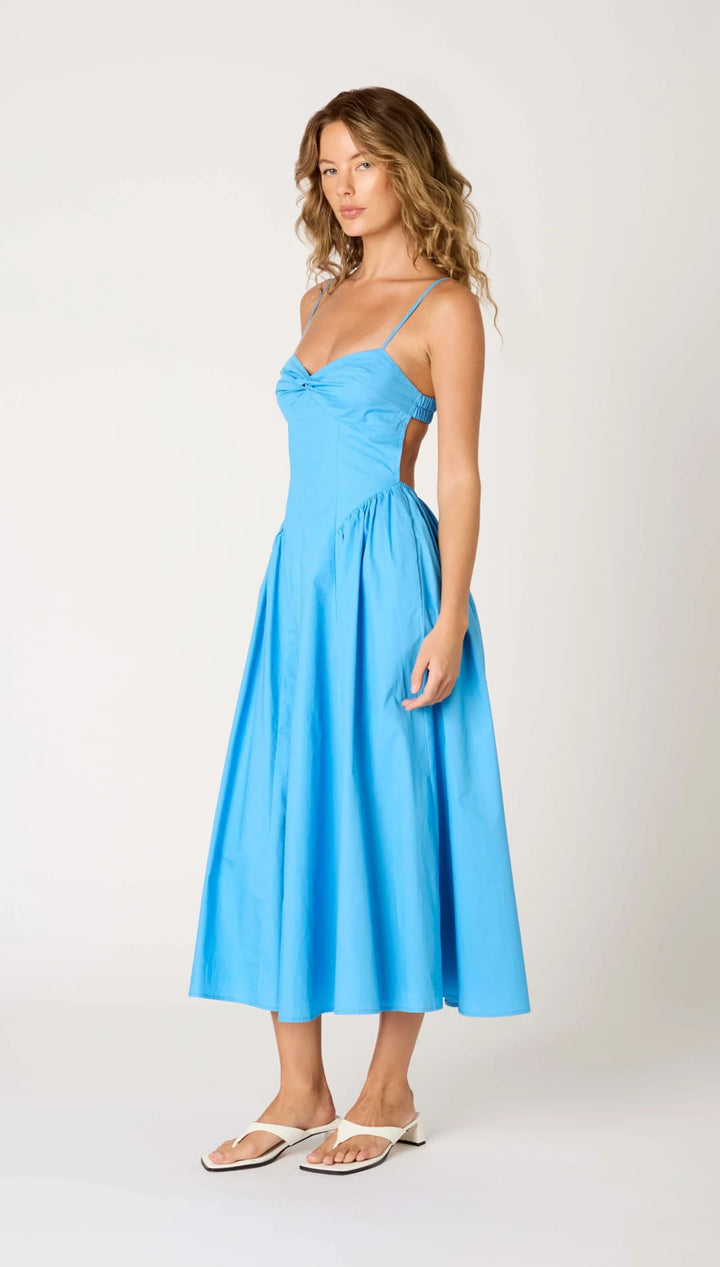 Woman in a blue sundress.