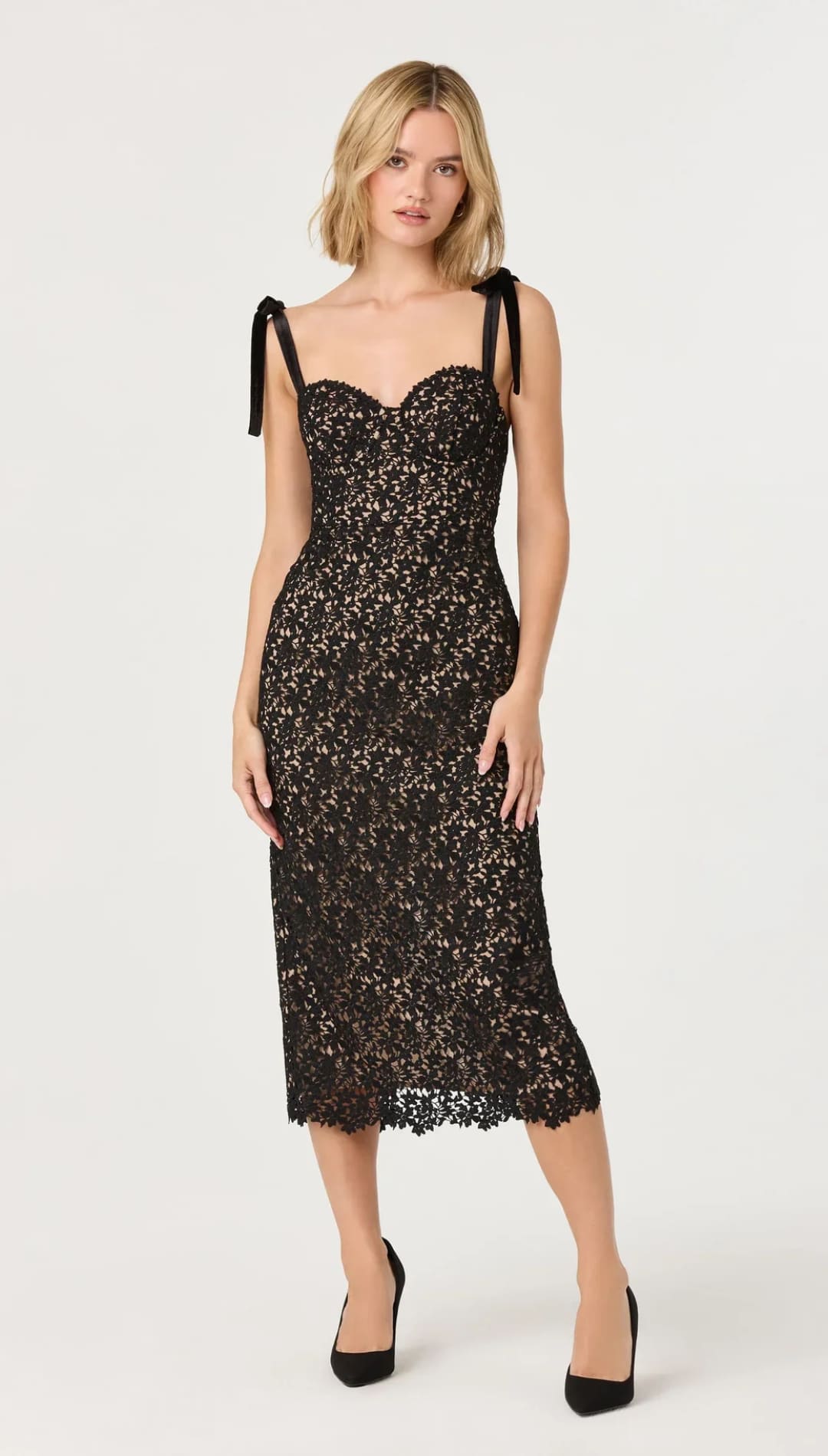 Black lace midi dress with delicate floral patterns and tied shoulder straps.