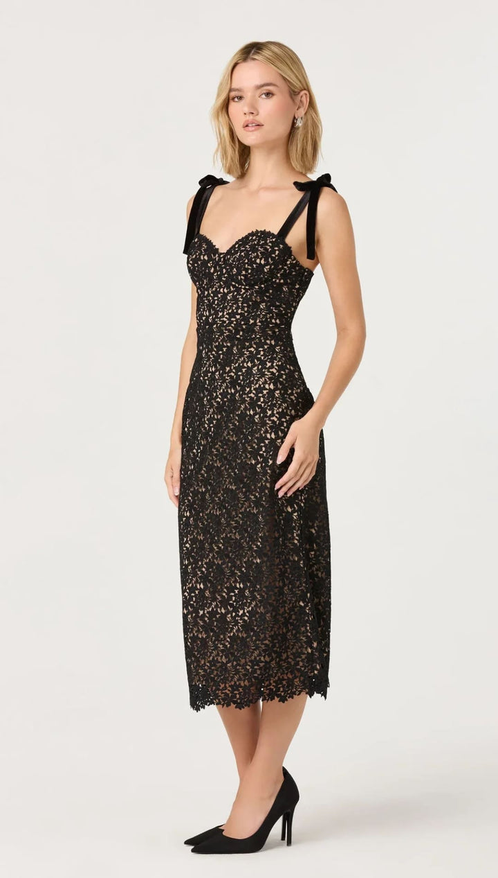 Black lace midi dress with delicate floral patterns and velvet ribbon straps.
