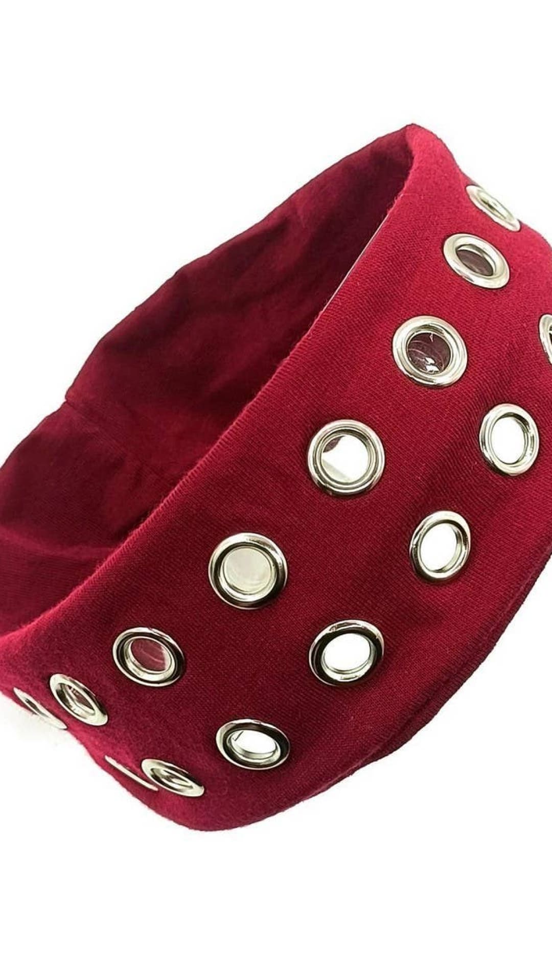 Burgundy velvet headband with silver eyelet details and adjustable elastic band