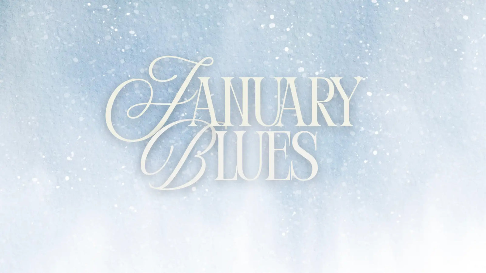 The elegant cream-colored cursive text ’january blues’ is displayed against a soft, snowy blue background.