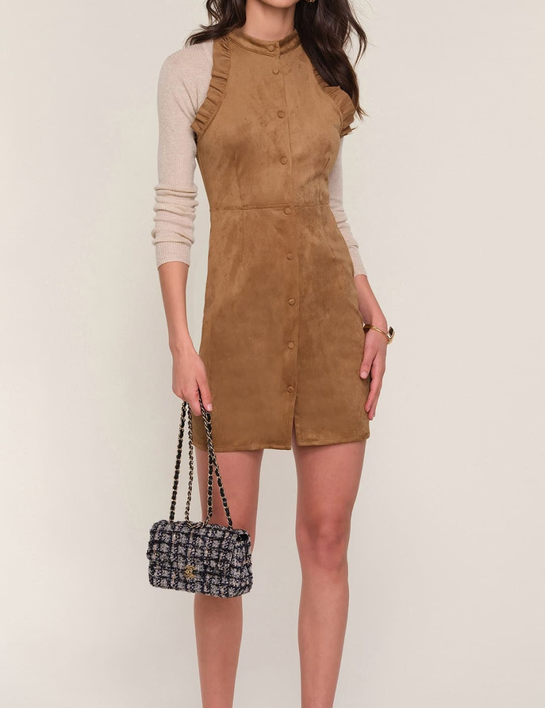 Brown corduroy mini dress with ruffled sleeves and button-down front.