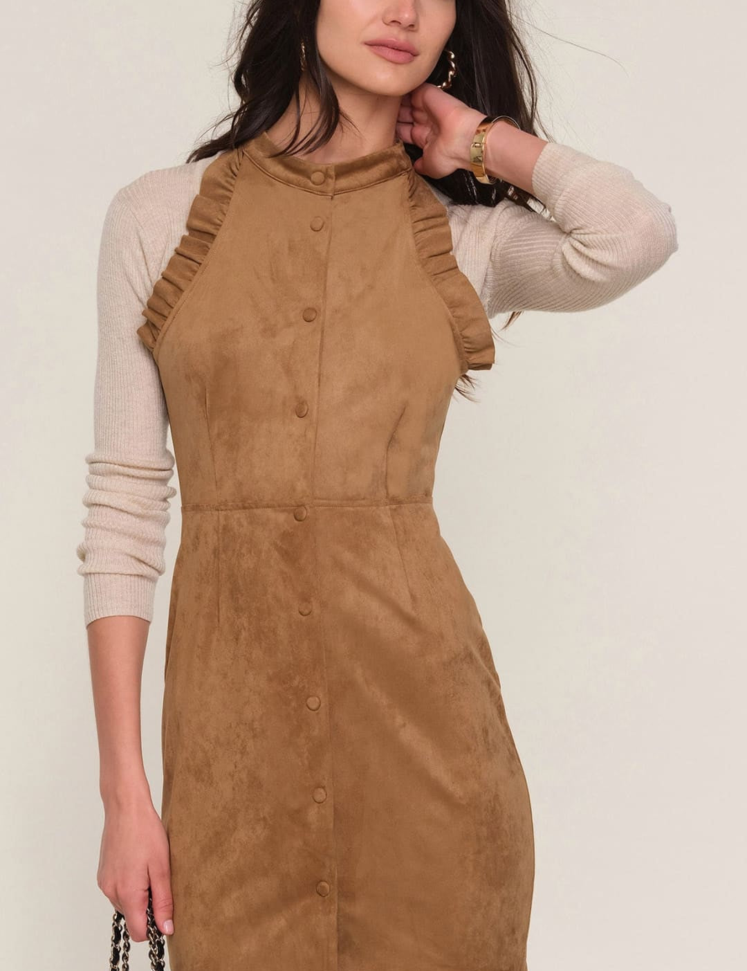 Brown suede dress with ruffled straps and button front.