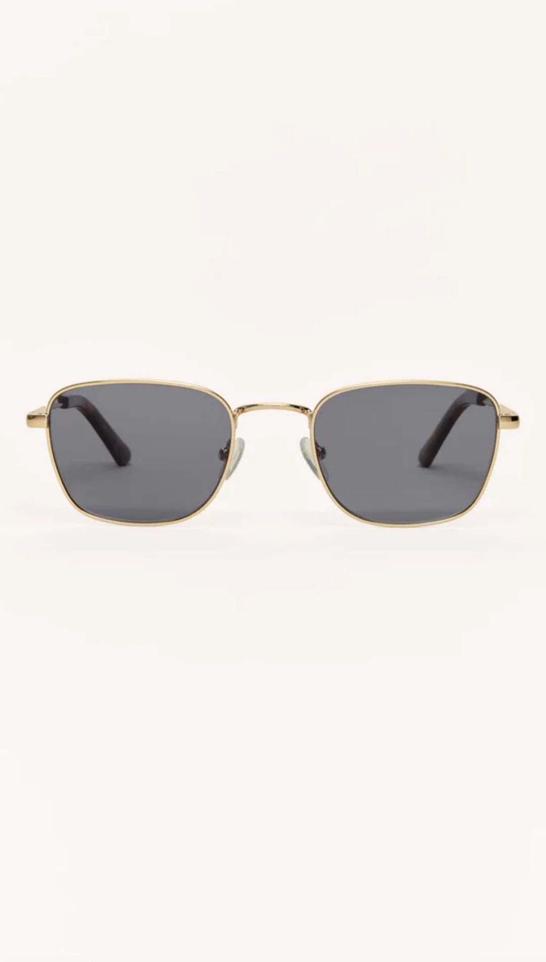 Square sunglasses with gold frames.