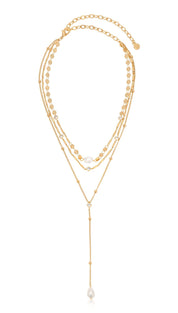 Gold-toned layered necklace with pearl accents.