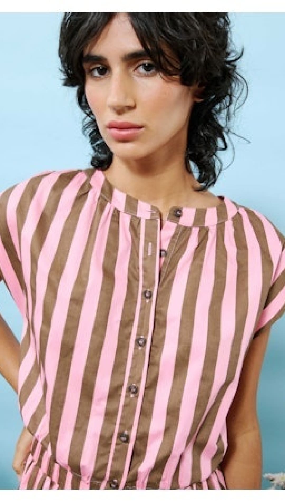 Pink and brown striped button-down top.