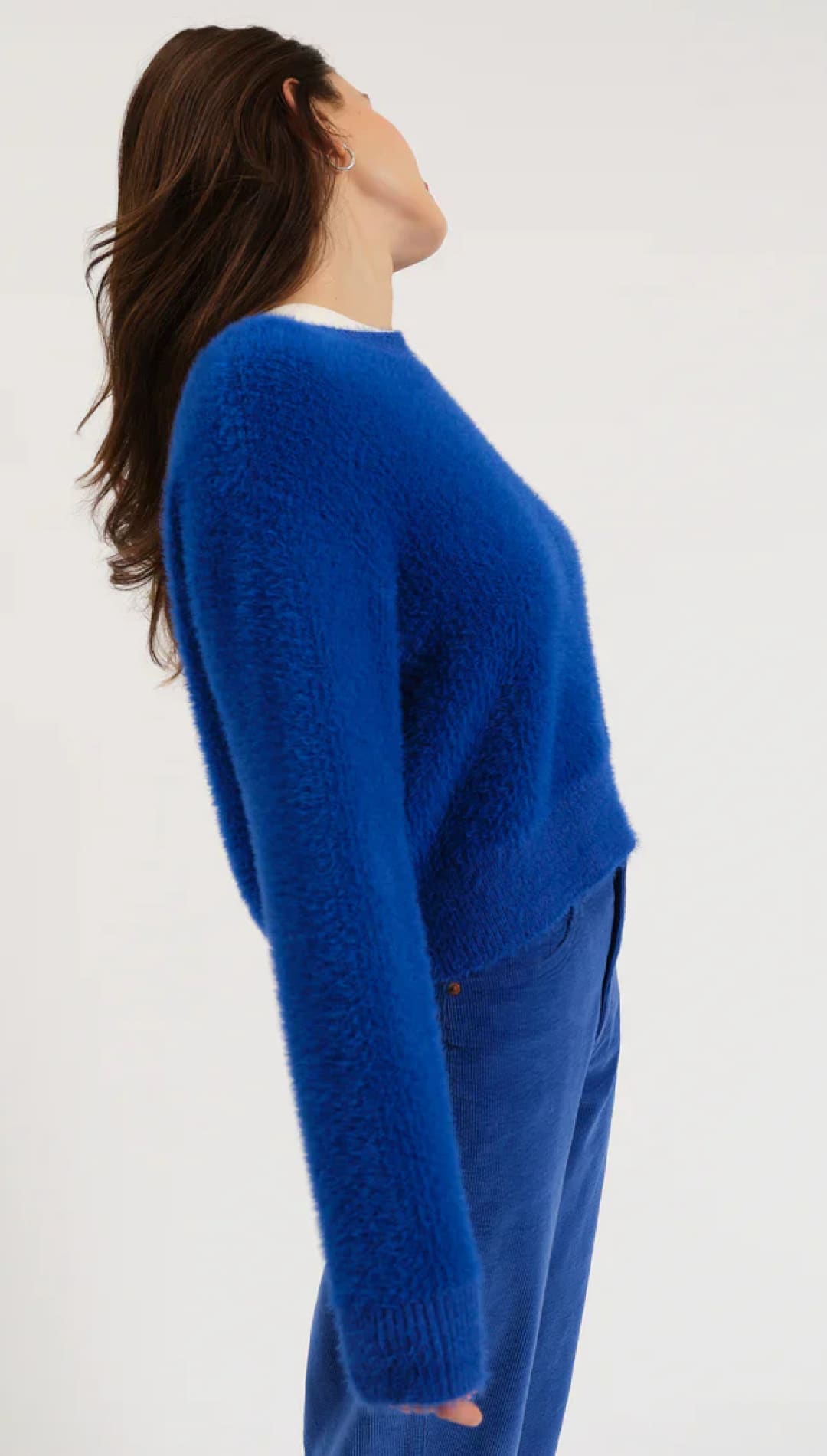 Royal blue cashmere sweater with ribbed cuffs and hem, inspired by a classic crew neck design.