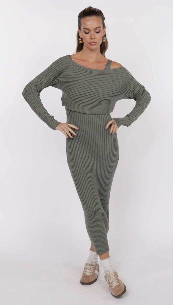 Olive green ribbed knit dress with asymmetrical neckline.