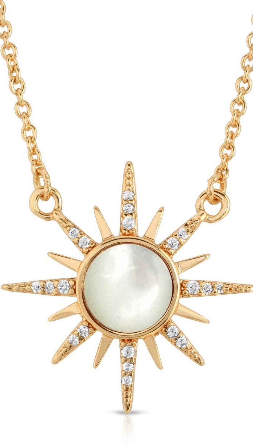 Gold sunburst pendant necklace.