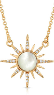 Gold sunburst pendant necklace.