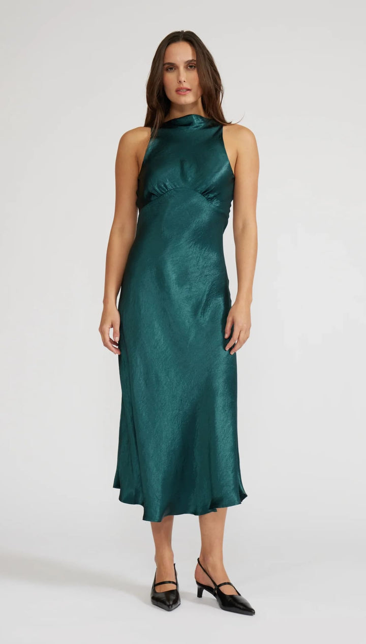 Emerald green satin halter neck dress with ruched bodice and high slit.emerald green satin halter neck dress with ruched bodice and high slit.