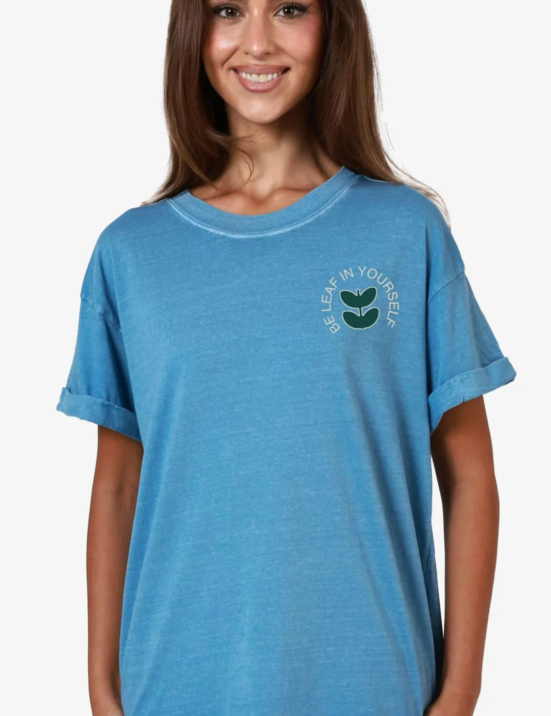 Blue t-shirt with rolled sleeves.