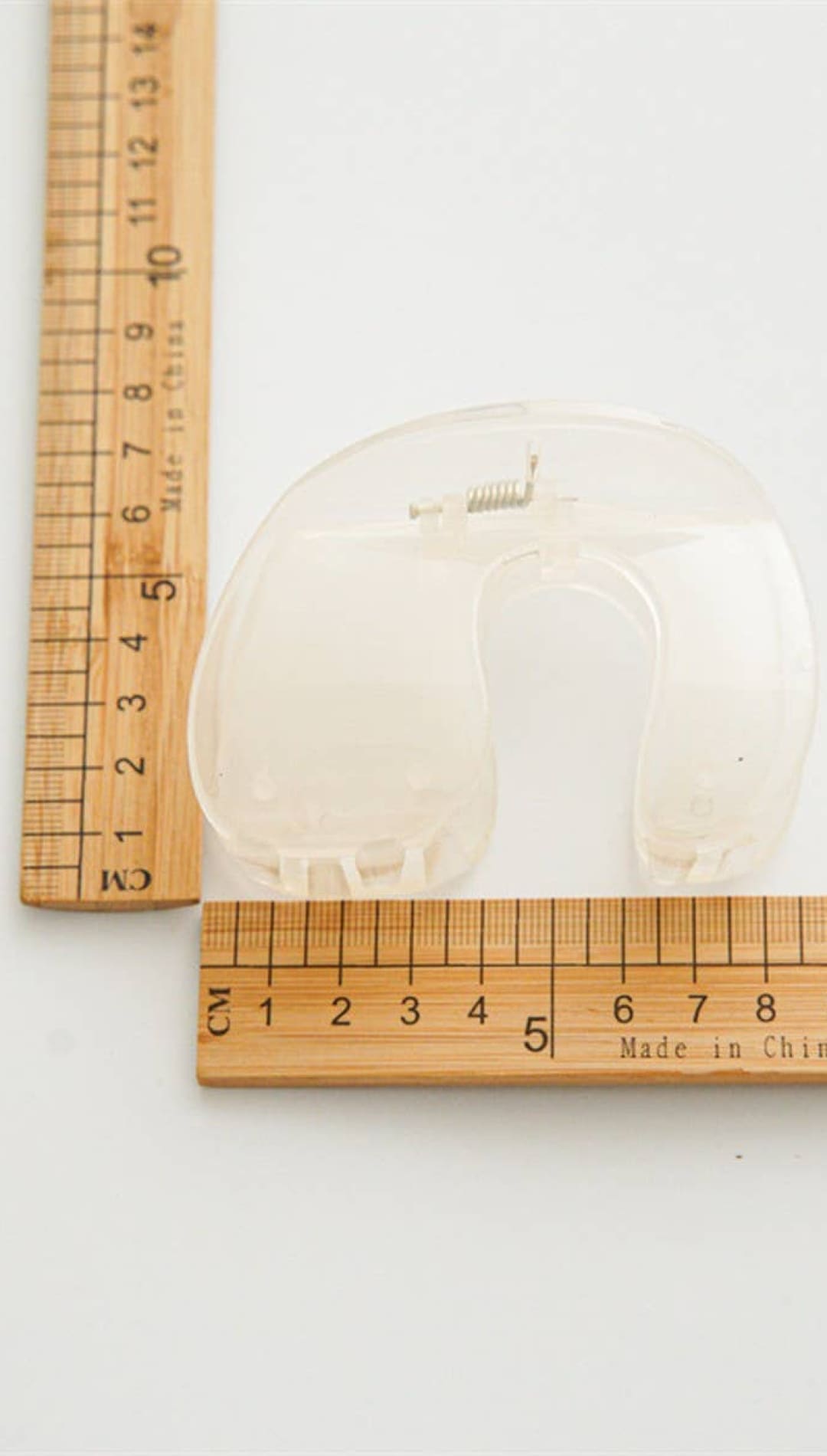 Clear plastic elephant-shaped cookie cutter with small metal hook for hanging, made in china