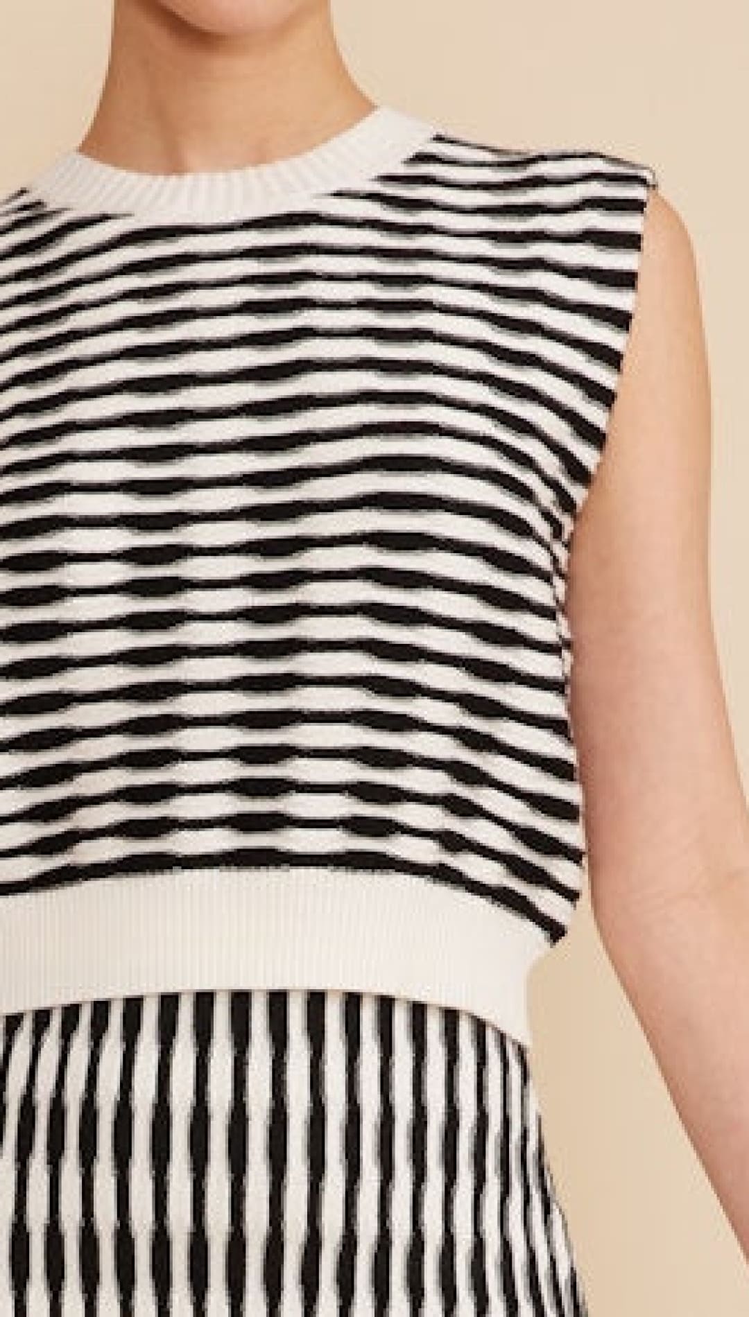 Black and white striped knit top.