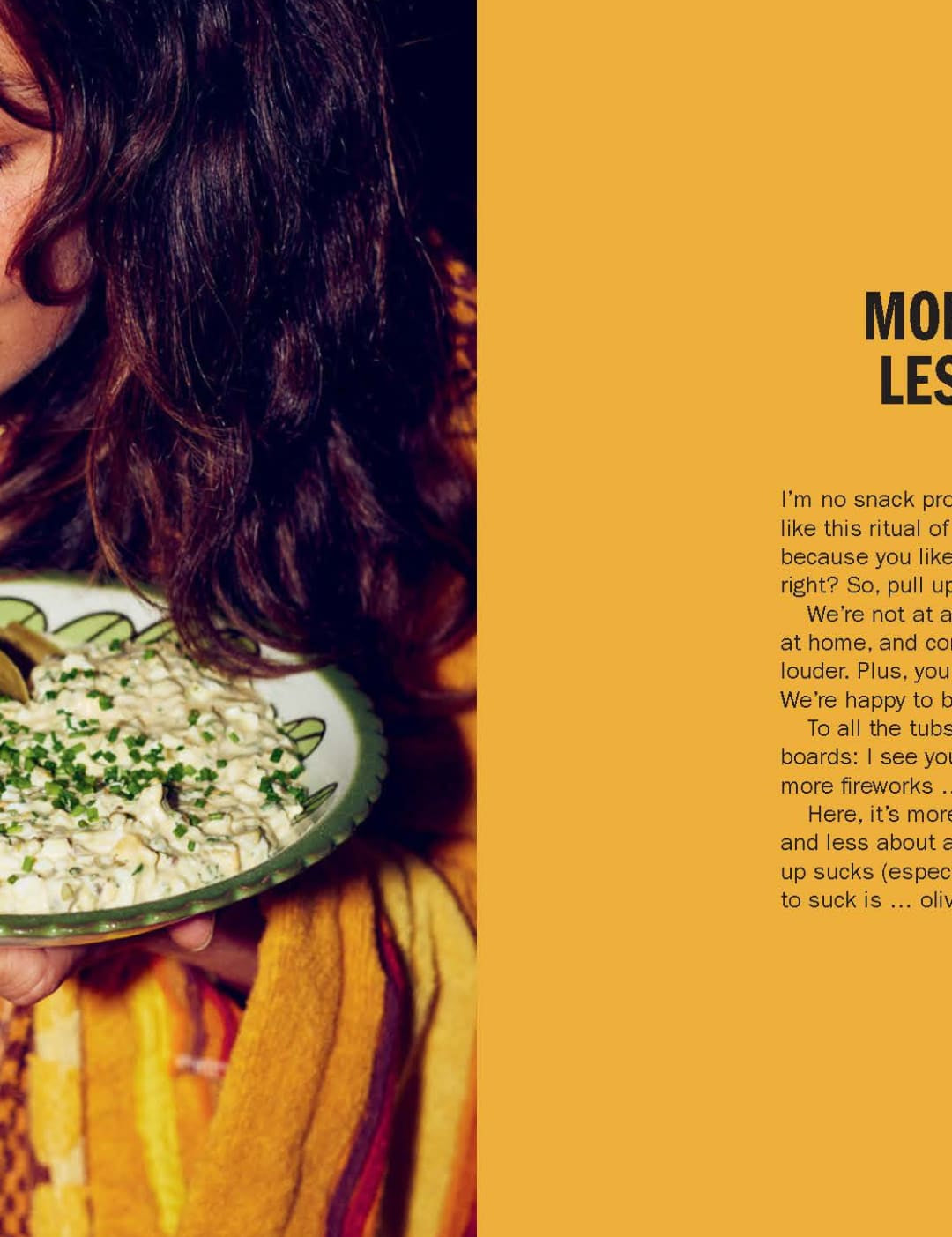 Ceramic bowl with green dip and herbs, yellow background.