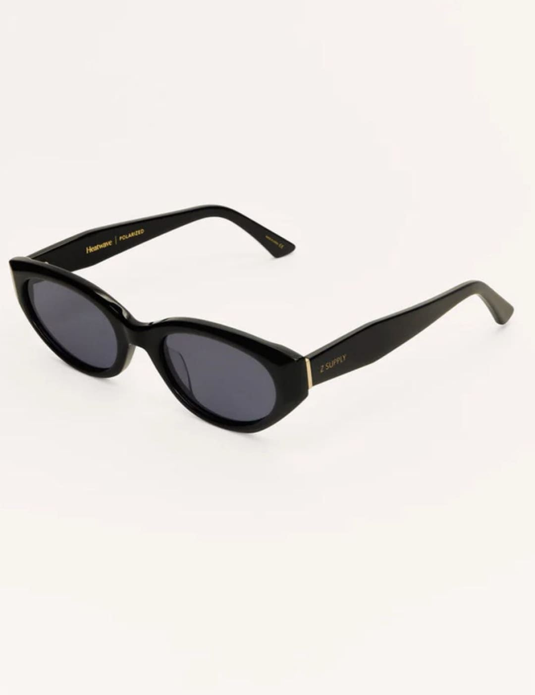 Black cat-eye sunglasses.